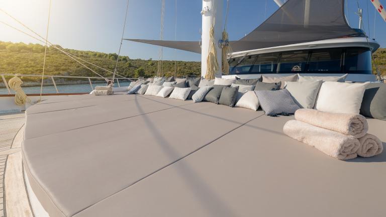 The XXL sun lounger with different coloured cushions on the main deck is a highlight of the Lady Gita.